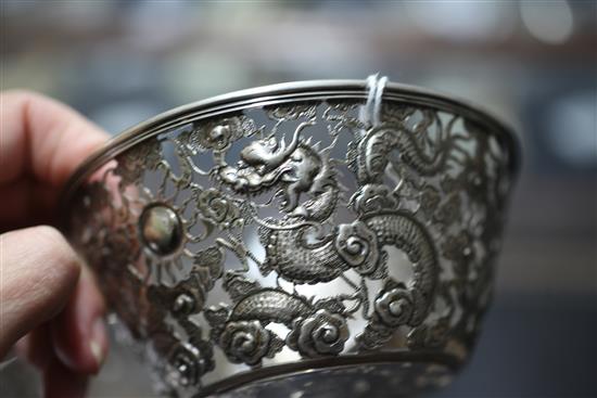 A pair of late 19th/early 20th century Chinese Export pierced repousse silver bowls, 8.5 oz.